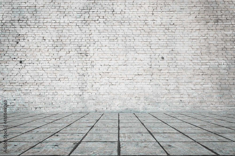 Fototapeta premium Empty room with bricks wall and tiled floor.