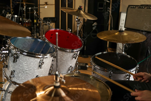 Drum set for sound recording. Drums in a metal case on the stand