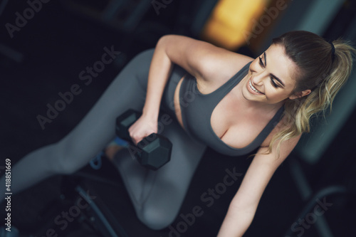 Adult woman working out in a gym