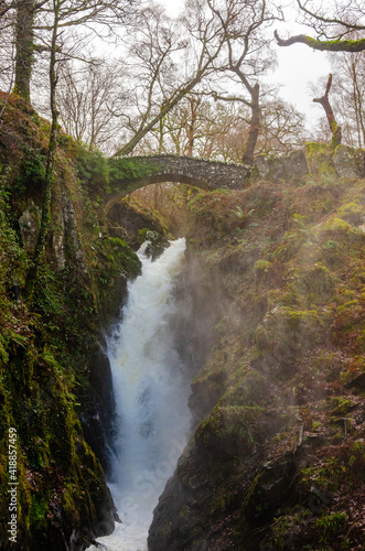 Aira Force Waterfall in the Lake District and bridge over it.
