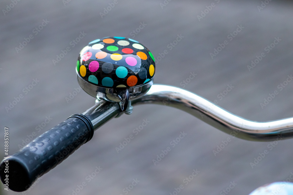 Obraz premium Beautiful bike bell shows love for cycling and sustainable mobility like bike sharing and environmental friendly emission free mobility with riding a bike as outdoor sport and recreation activity