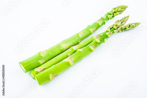 Spring seasonal vegetable asparagus on white background