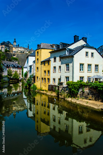 Luxembourg city, Luxembourg - July 16, 2019: Scenic view of buildings reflected in Alzette river in the Old Town of Luxembourg city in Europe