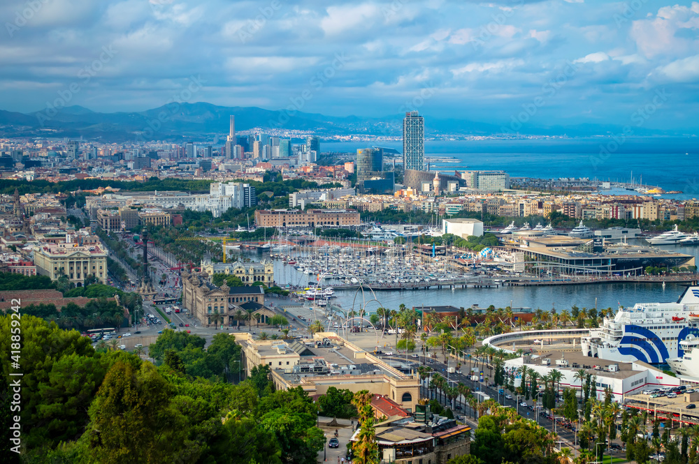 Barcelona, Spain - July 27, 2019: Beutiful panoramic view of Barcelona coastline and Mediterranean sea on a summer day, Catalonia, Spain Barcelona, Spain - July 27, 2019: Beutiful panoramic view of Barcelona coastline and Mediterranean sea on a summer day, Catalonia, Spain