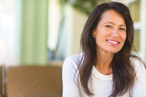 Portrait of a confident mature woman smiling.