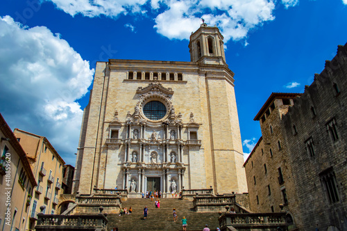 Girona, Spain - July 28, 2019: People walking up the stairs of the Cathedral of Saint Mary of Girona in Catalonia, Spain