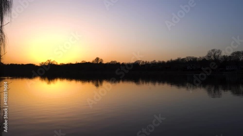 Beautiful calm lake at sunset