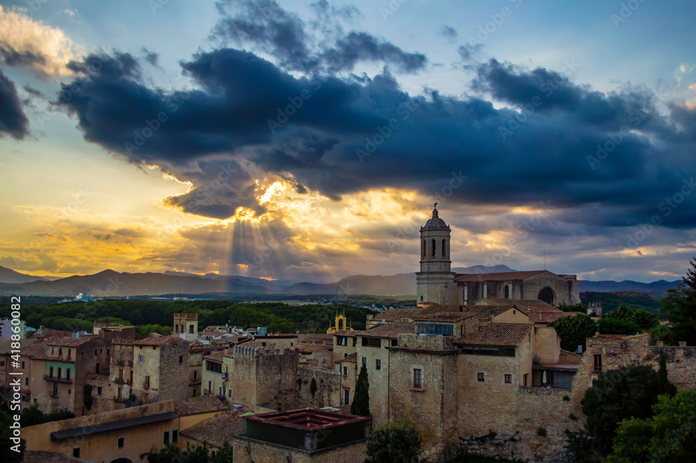 Girona, Spain - July 28, 2019: Cityscape of the city of Girona with the famous Girona cathedral at sunset, Catalonia, Spain