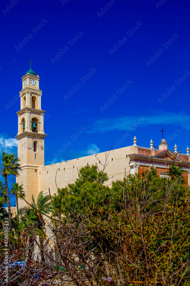 Tel Aviv, Israel - March 04, 2021: St. Peter's Church in Jaffa. It was built in 1642. The church was built on top of an ancient fort that dominated the port and protected it. Tel Aviv, Israel - March 04, 2021: St. Peter's Church in Jaffa. It was built in 1642. The church was built on top of an ancient fort that dominated the port and protected it.