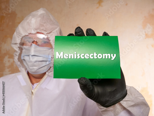 Healthcare concept about Meniscectomy with inscription on the piece of paper. photo