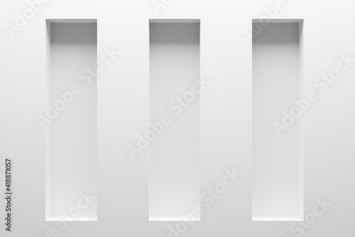Slika na platnu Empty modern abstract white room wall with three vertical blank niches or recess