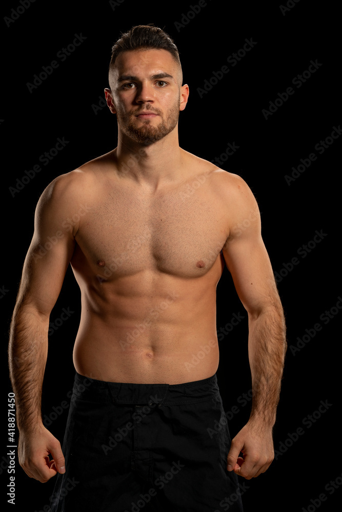 Fototapeta premium UFC fighter on a black background