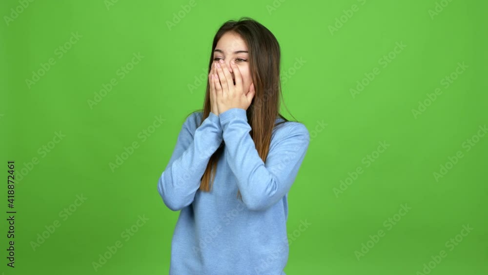 Young caucasian woman with surprise and shocked facial expression over isolated background. Green screen chroma key Young caucasian woman with surprise and shocked facial expression over isolated background. Green screen chroma key