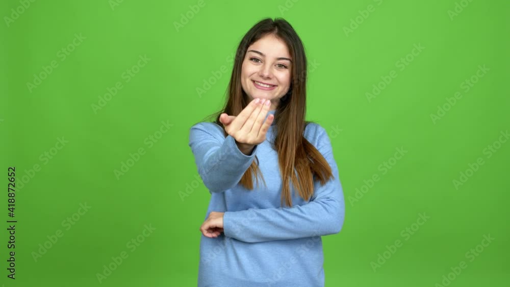 Young caucasian woman presenting and inviting to come with hand over isolated background. Green screen chroma key Young caucasian woman presenting and inviting to come with hand over isolated background. Green screen chroma key