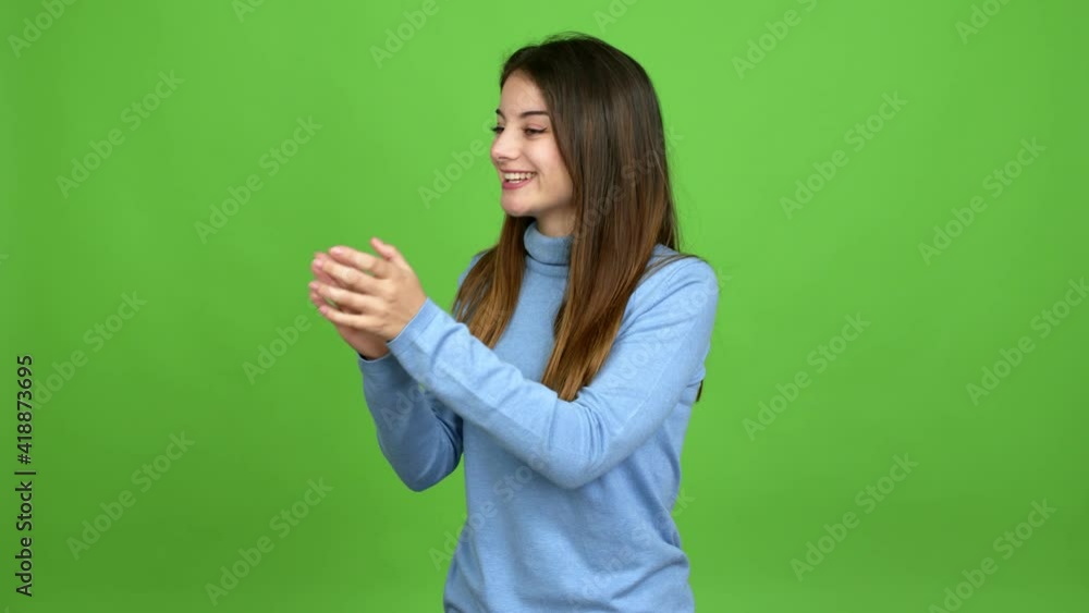 Young caucasian woman applauding after presentation in a conference over isolated background. Green screen chroma key Young caucasian woman applauding after presentation in a conference over isolated background. Green screen chroma key