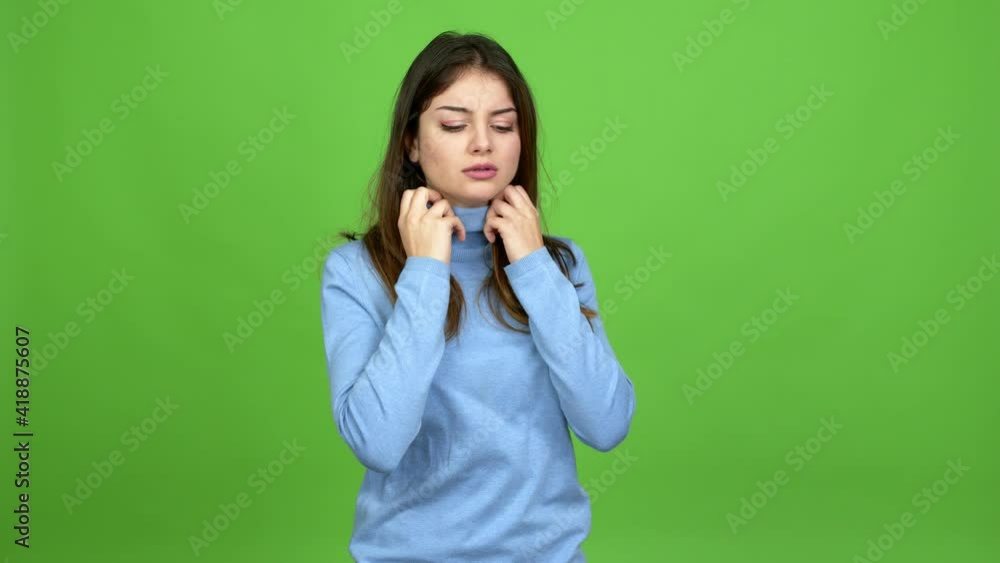 Young caucasian woman with sore throat over isolated background. Green screen chroma key Young caucasian woman with sore throat over isolated background. Green screen chroma key