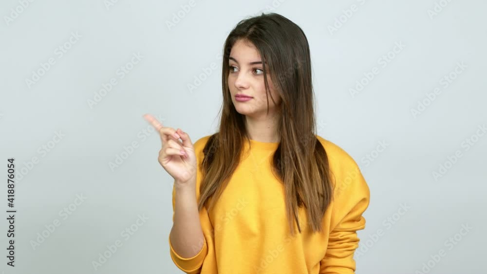 Young caucasian woman doing NO gesture over isolated background Young caucasian woman doing NO gesture over isolated background