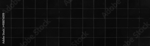 Panorama of Black wall glazed tile texture and background seamless photo