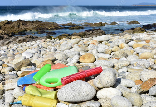 Beach with plastic pollution at famous Rias Baixas Region. Galicia, Spain.