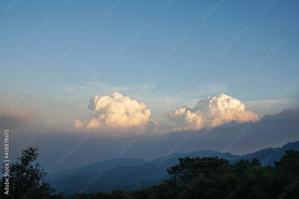 nature landscape of mountain top view with big white fluffy clouds in ...