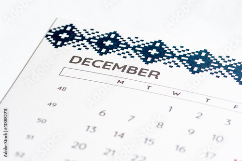 Month of December 2020 on the calendar on a white table with days, close up photo