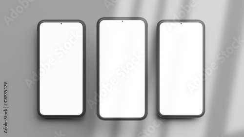 Three vertical phones mockup isolated on a grey background in flat lay and 3D rendering. Realistic template of cellphone frame and blank display concept for presentation