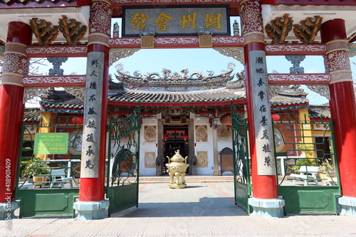 Hoi An, Vietnam, March 8, 2021: Colorful entrance door of a Taoist Temple in Hoi An, Vietnam