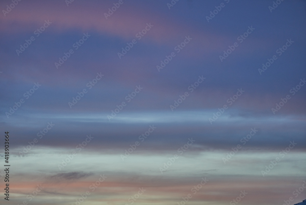Obraz premium Striped blue red blue sky in the mountains