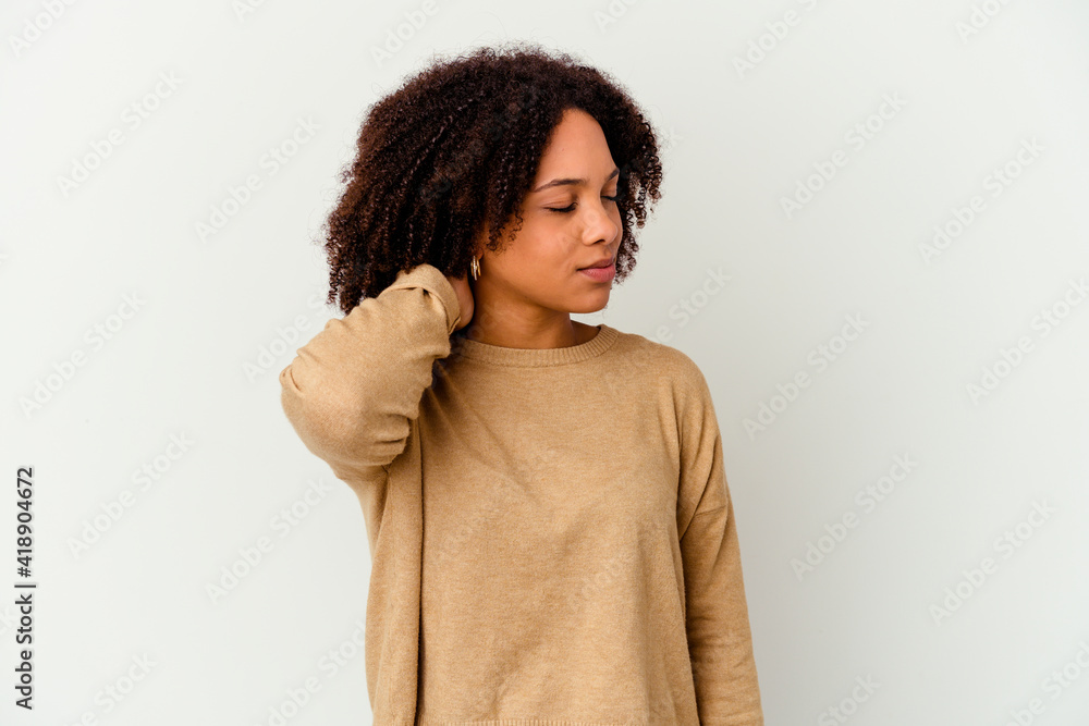 Young african american mixed race woman isolated suffering neck pain due to sedentary lifestyle. Young african american mixed race woman isolated suffering neck pain due to sedentary lifestyle.