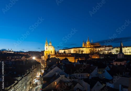 View from the Charles bridge tower in Prague to Prague Palace and cathedral at night