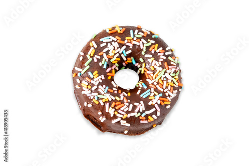 Donut with colorful sprinkles on white background.