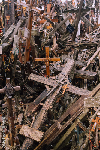 Several wooden crosses lying on the ground. Concept of faith, religion, death, sacrifice, and despair.