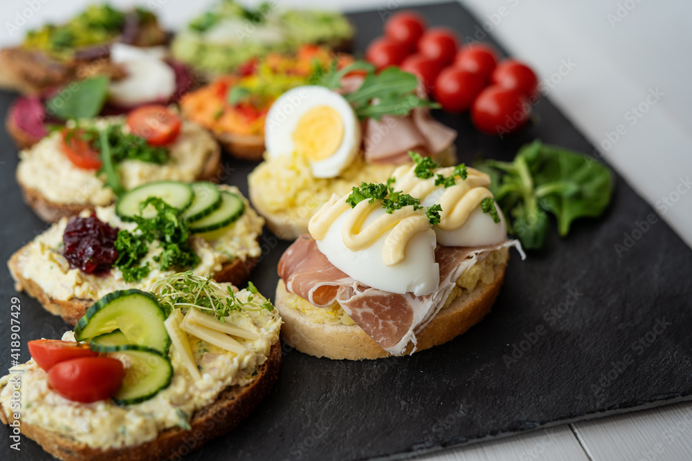 col cut meat egg mayonnaise salad proscuito ham cucumbr cheese open sandwich board selection col cut meat egg mayonnaise salad proscuito ham cucumbr cheese open sandwich board selection