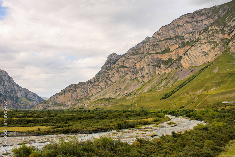 Fototapeta premium Mountain valley beautiful landscape, cloudy