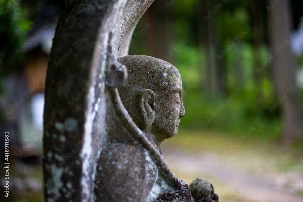 Closeup Unknown Japanese Jiro Statue in the woods. Closeup Unknown Japanese Jiro Statue in the woods.