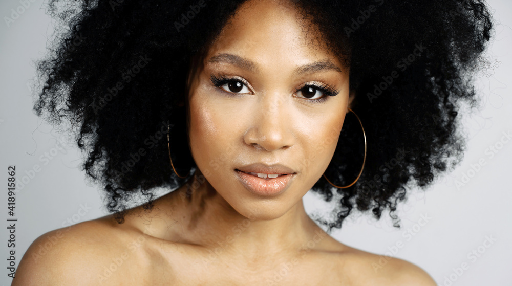 Beauty Portrait of a young female model of Afro-appearance posing ...