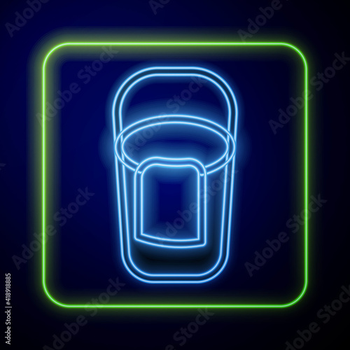 Glowing neon Bucket with rag icon isolated on blue background. Cleaning service concept. Vector.