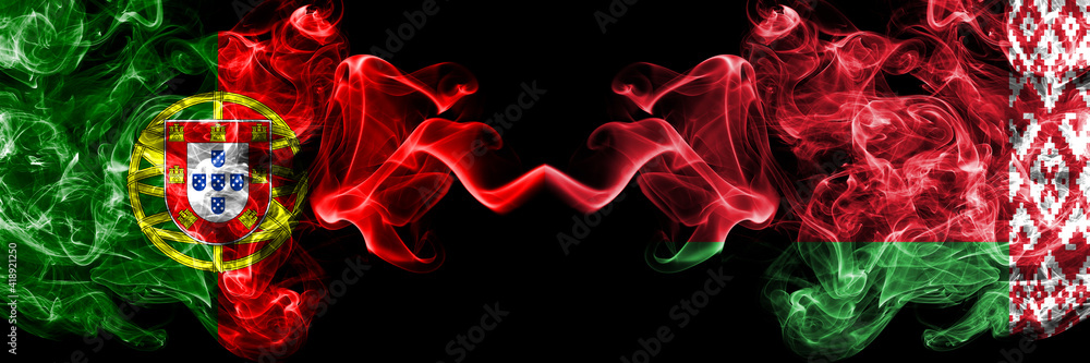 Portugal, Portuguese vs Belarus, Belarusian smoky mystic flags placed side by side. Thick colored silky abstract smoke flags. Portugal, Portuguese vs Belarus, Belarusian smoky mystic flags placed side by side. Thick colored silky abstract smoke flags.