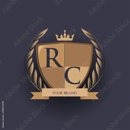 initial letter RC logotype colored brown and gold isolated with shield, crown and laurel design, logo for college and sport club.