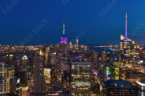 Empire State Building at night in New York City. It is a 102-story landmark and was world s tallest building for more than 40 years.