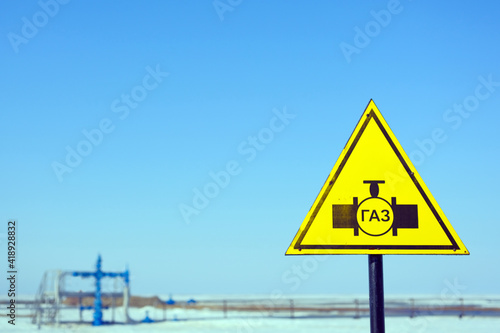 Ecology. Gas industry. Beautiful yellow sign. Caution Gas
