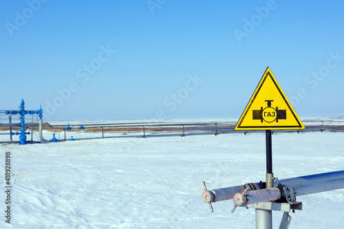 Ecology. Gas industry. Beautiful yellow sign. Caution Gas