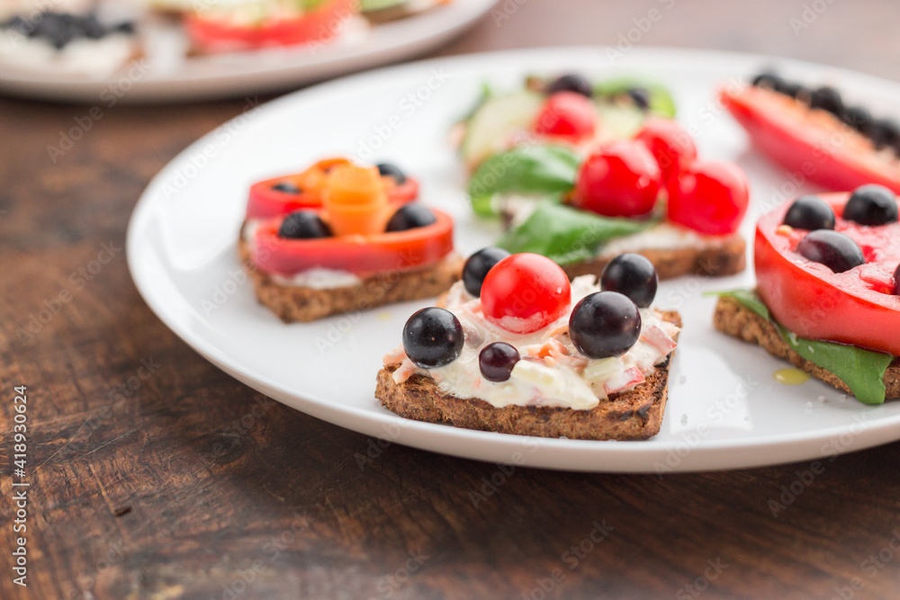 Freesh vegetarian sandwiches on a white plate Freesh vegetarian sandwiches on a white plate