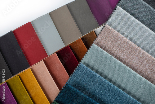 Obraz na plátně Samples of fabrics of different texture and color in the form of a catalog for t