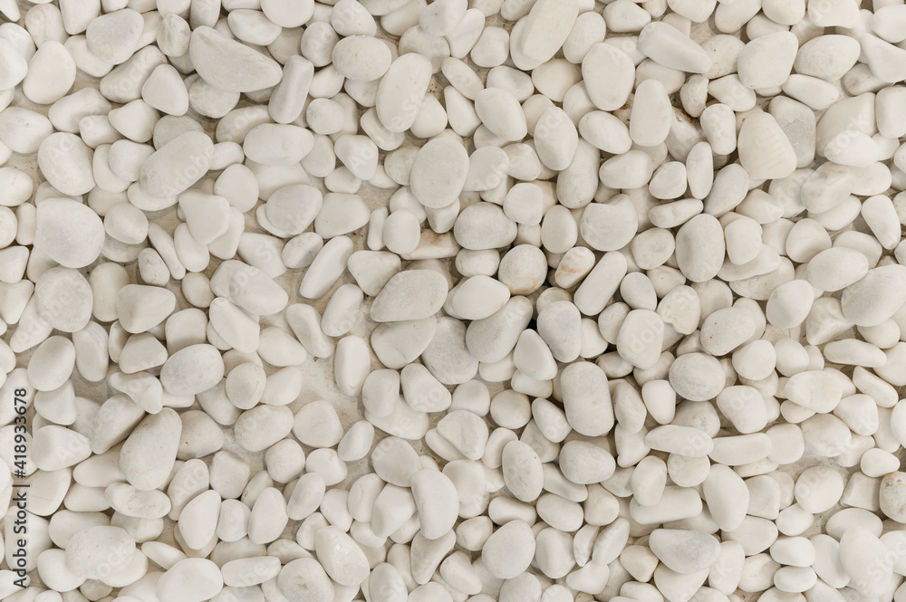 background with beach stones. beautiful stones of different shapes and sizes. stone texture. modern background with stone background with beach stones. beautiful stones of different shapes and sizes. stone texture. modern background with stone
