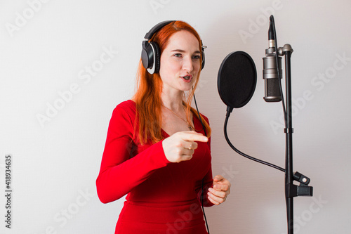 The professional singer is preparing to record a new song photo