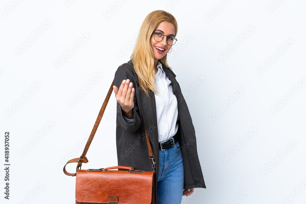 Business Uruguayan woman over isolated white background inviting to come Business Uruguayan woman over isolated white background inviting to come