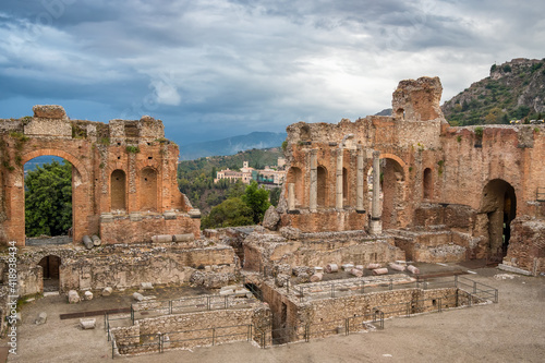 Amphitheatre of Taormina in Siciliy at cloudy day, Italy.