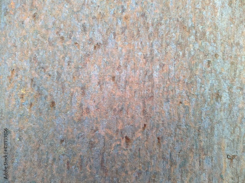 Colored rusty stained metal wall texture pattern