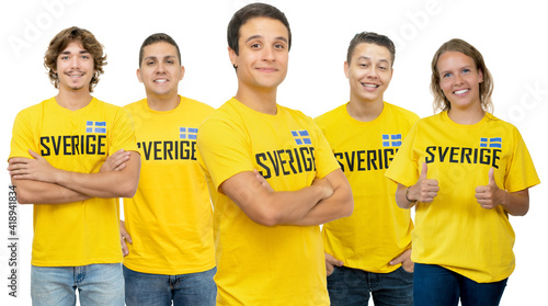 Smiling football fan from Sweden with group of swedish supporters photo